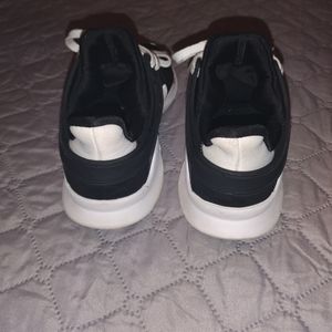 Women's Adidas Equipment black and white tennis shoes
